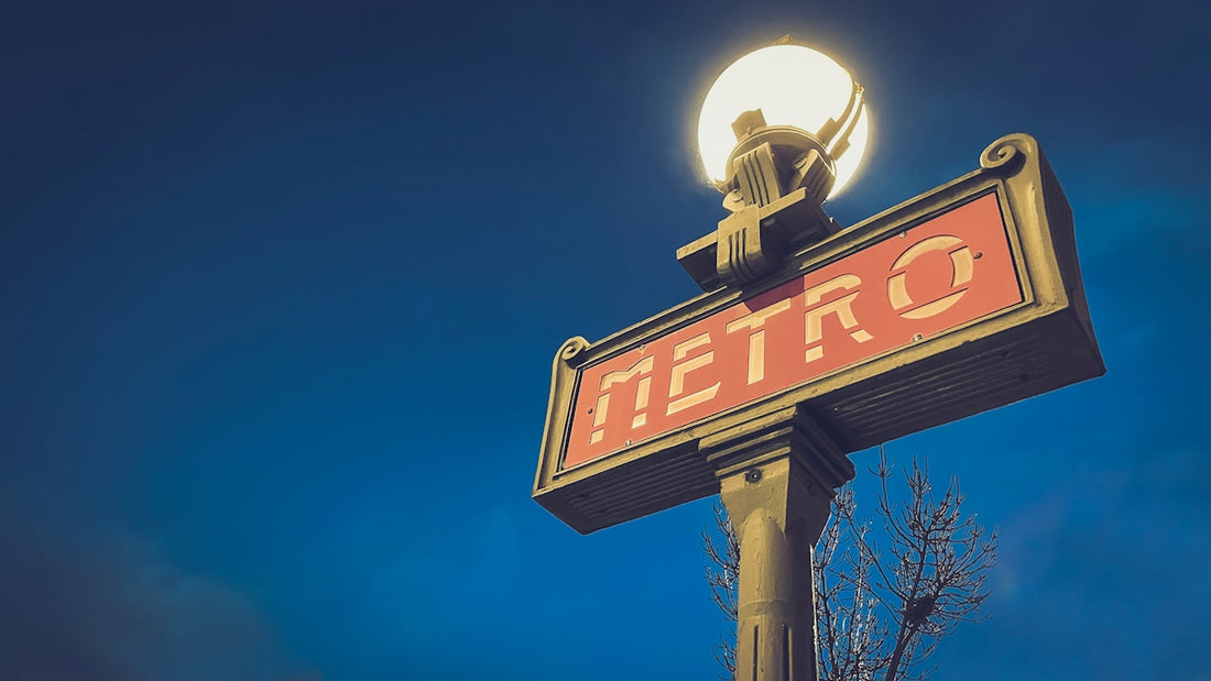 a sign with a light on top