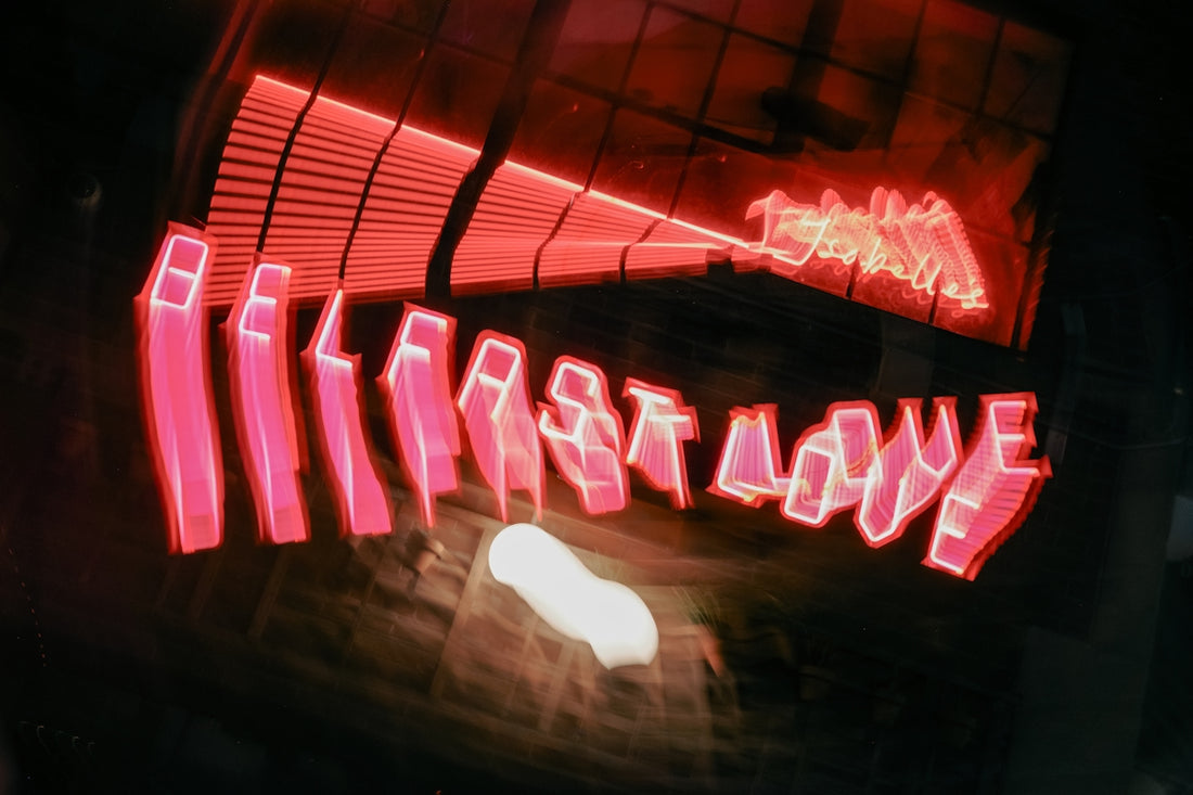 Blurry red neon sign with belfast love text belfast love